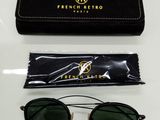 a pair of sunglasses and a case on a table