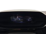 the dashboard of a car with a digital display in the center