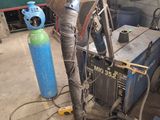 a motorcycle that is being worked on in a garage