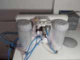 a picture of a water filtrator sitting on a table