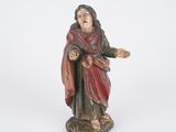 figurine of a man with a red robe and a red robe