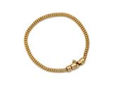a gold beaded bracelet with a ball clasp on a white background