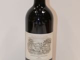 a bottle of wine that is sitting on a table