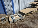 many pieces of wood that are laying on the ground