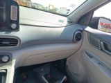 a car dashboard with a phone in the center of it
