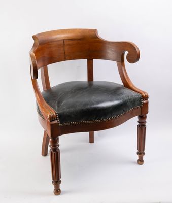 an image of a wooden chair with black leather upholstered seat