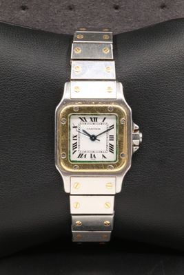 a close up of a wrist watch on a display case