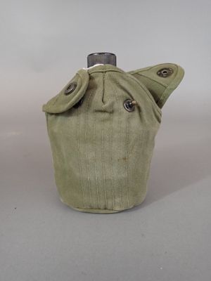 a bottle that has a face on it
