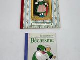 two books that are sitting on a table