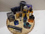 many different types of perfumes on a tray
