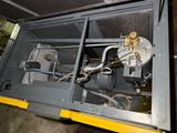 a machine that is sitting inside of a metal box