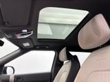 a view of the sunroof of a car from the inside