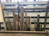 many pieces of wood in a pile on the floor