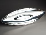 a silver plate that is sitting on a table