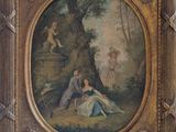 un vieux tableau représentant un couple dans un décor boisé