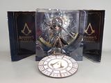 a figurine of a woman with a clock in front of a box