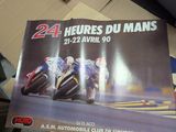 a poster of a motorcycle racing event on a table