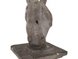 an image of a sculpture of a horse head on a stone base