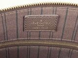 a close up of a purse with a zipper on the inside