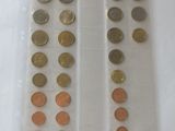 a lot of coins in a plastic bag on a table