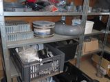 a room with a lot of items on the shelves
