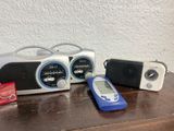 several electronic devices are sitting on a table next to each other