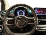the interior of a car with a steering wheel, dashboard, and display screen
