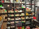 a room with a lot of boxes and boxes on the shelves