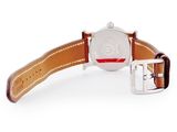 an image of a close up of a watch on a white surface