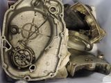 a box full of old and rusty parts in it