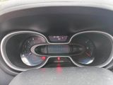a close up of a car dashboard with a speedometer