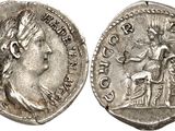 a silver coin with an image of a woman on it