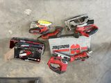 several tools that are laying on the floor