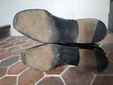 a pair of shoes that are sitting on the ground