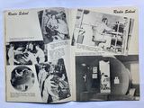 an open book with a bunch of pictures on it on a table