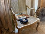 a chair that is sitting in front of a window