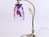 an image of a lamp with a glass shade on top of it