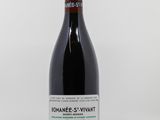 la bouteille de vin rouge est posée sur la table