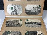 an old photo of an open book with pictures of buildings and people