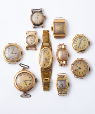 several different types of watches are arranged in a circle on a white surface