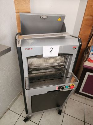 a machine that is sitting in the corner of a room