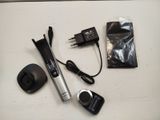 an image of a hair dryer and other items on a table