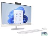 a desktop computer with a keyboard and mouse next to it