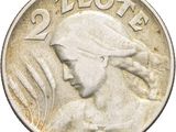 a close up of a coin with a woman ' s head on it