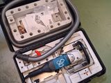 a case with tools in it on a table