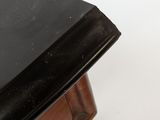 an image of a close up of a table with a clock on it