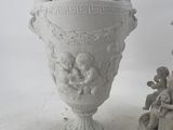 pair of white vases with cherenshes and cherenshes on them