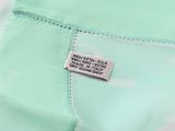 a close up of a label on a shirt