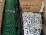 a cardboard box filled with assorted items in it
