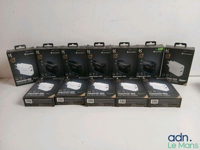 six boxes of nintendo wii controllers sitting on a white surface